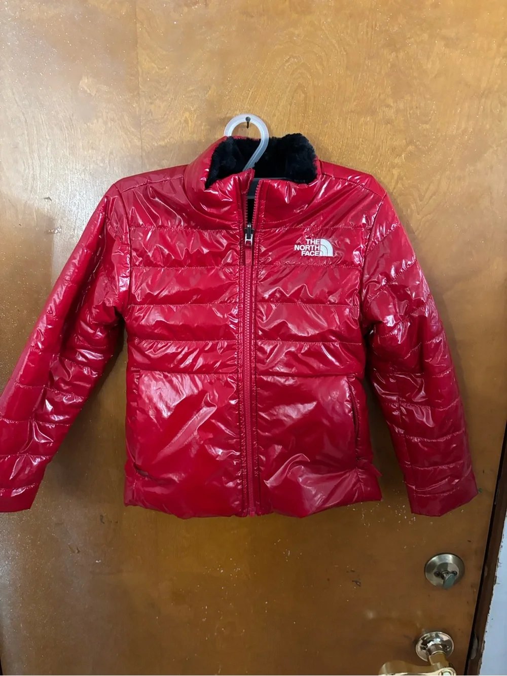The North Face coat.  Girls. Red reversible